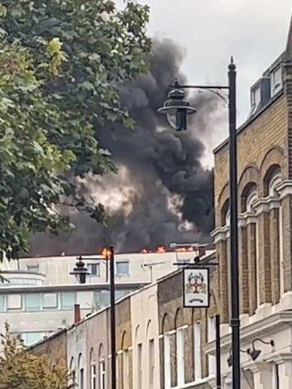 The roof of a business centre is alight