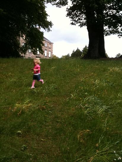 Ella running down a hill