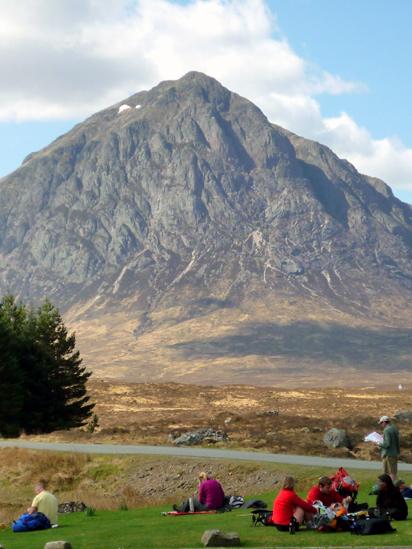 Walkers resting by Buachaille Etive Mor