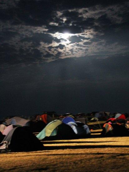 Moonlight over a campsite