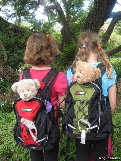 Teddy bears in backpacks