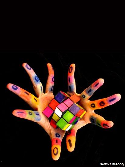 Rubiks cube in hands