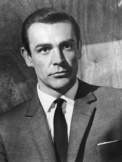Scottish actor Sean Connery wears a suit jacket and a tie as James Bond in a still from director Terence Young's film, 'From Russia with Love' 1963