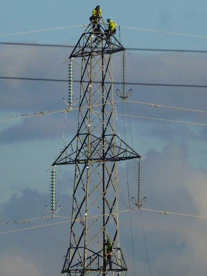 Engineers working on a pylon