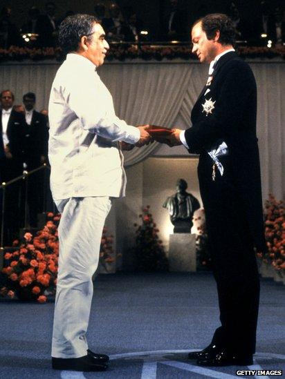 Colombian writer Gabriel Garcia Marquez (L) receives the Nobel Prize for Literature from the hand of King Carl Gustav of Sweden 10 December 1982 in Stockholm.