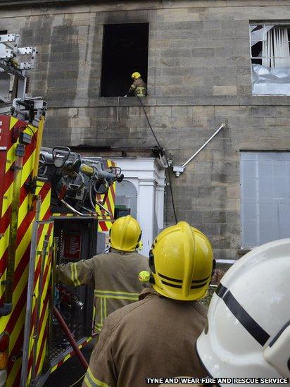 Firefighters hurt in ceiling collapse after arson attack - BBC News