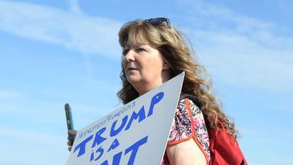 Janey at her infamous protest against Donald Trump