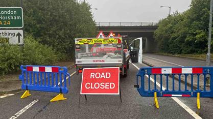 Road closure sign on A24 at Ashington 