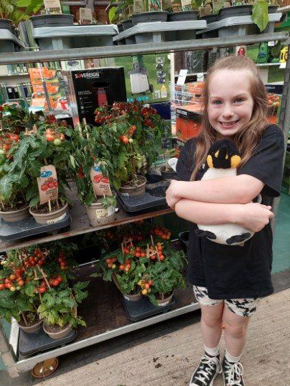 Harriet Thompson pictured in front of plants