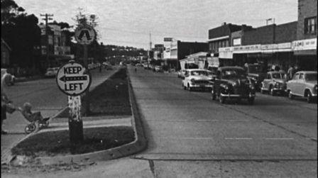 Greyscale image of a suburban street in Australia in the 1960s