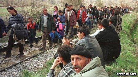 Ethnic Albanians flee Kosovo in 1999