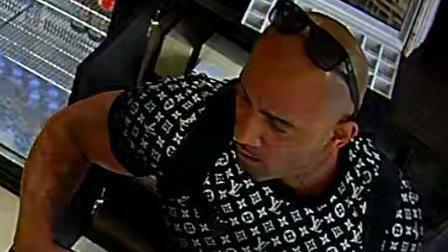 CCTV image of man taken during robbery at Kew jewellers