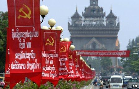 Banners marking the eighth national congress of the Lao People's Revolutionary Party adorn Vientiane's main boulevard