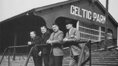 Men standing in grounds of Celtic Park