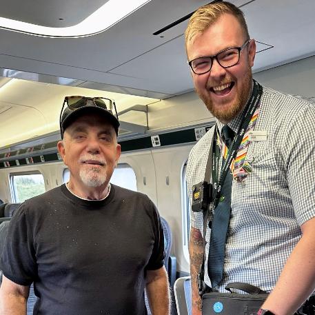 Billy Joel with Great Western Railway ticket conductor