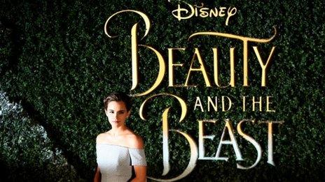 Emma Watson by Beauty and the Beast logo