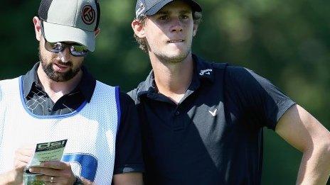 Thomas Pieters (right) with caddie