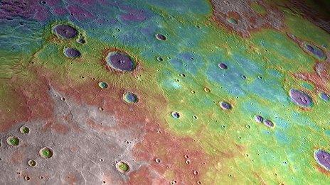 Mercury's northern plains (Nasa). False colour elevation information - white is high; blue is low