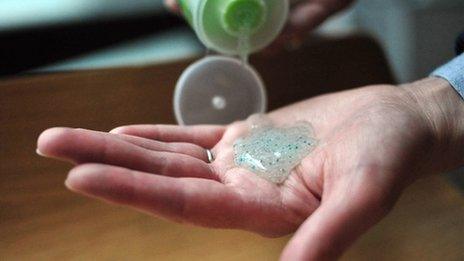 woman's hand with microbead gel