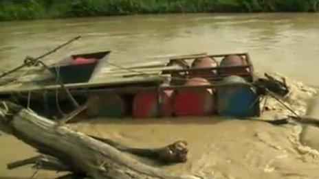 Makeshift barge used for mining on rivers in Ghana