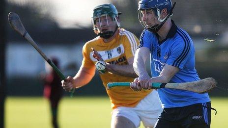 Antrim's Neill McKenna challenges Fionntan McGibb of Dublin in the Walsh Cup game