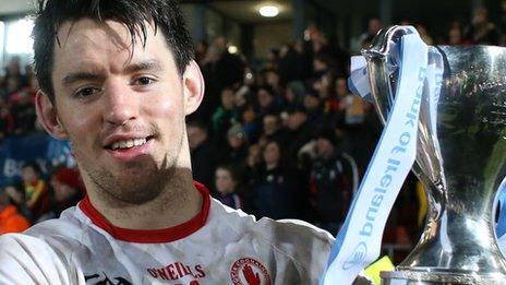 Tyrone's Mattie Donnelly lifts the Dr McKenna Cup after the 2016 final win over Derry