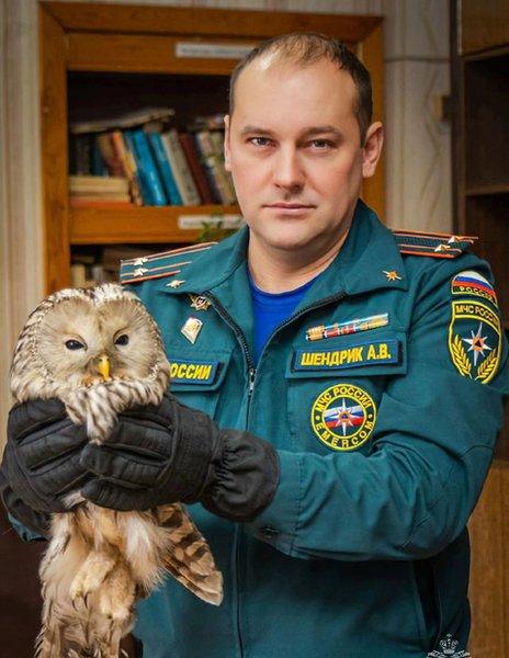 Owl with firefighter