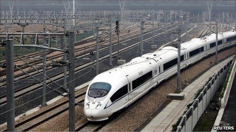 A high-speed train travels on the newly built Shanghai-Nanjing railway in Shanghai July 1, 2010