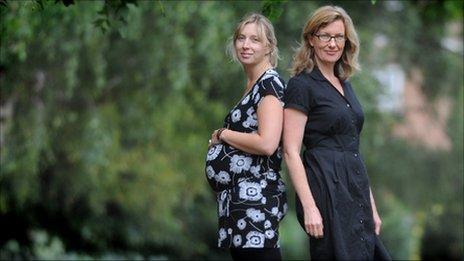 One pregnant, one not (picture posed by models)