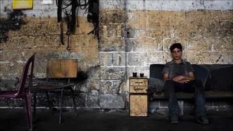 Raed Ahmed Moussa, 14, at his workshop, July 2010, Gaza City