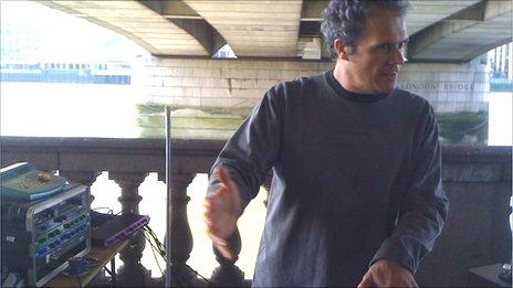 Nick Franglen playing his theremin under London Bridge