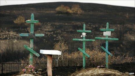 Crosses in a cemetery charred by fire at Russkaya Budnevka, Volgograd region, 5 September