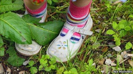 Shoes among weeds