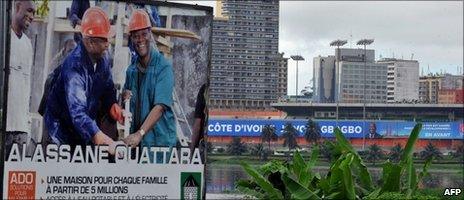 Photo taken on 19 October 2010 shows an election campaign poster for Alassane Ouattara