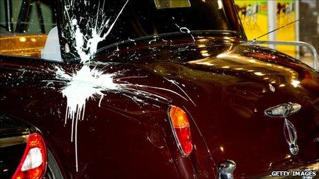 Prince Charles and the Duchess of Cornwall's car after it was attacked by protesters