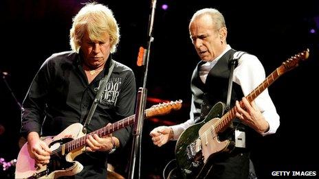 Musicians Rick Parfitt (L) and Francis Rossi of Status Quo perform at The Prince's Trust Rock Gala 2010