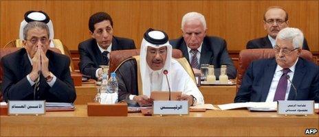 Qatari PM chairs the Arab foreign ministers meeting as Amr Moussa (L) and Mahmoud Abbas look on, Cairo, 15 December