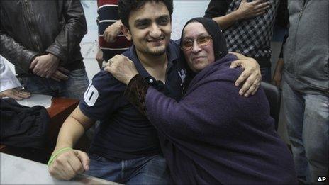 Wael Ghonim embraces the mother of dead businessman Khaled Said in Tahrir Square, 8 February