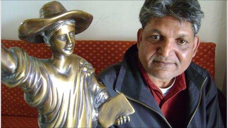 Dr Chandra Bhan Prasad with the statue of the English goddess