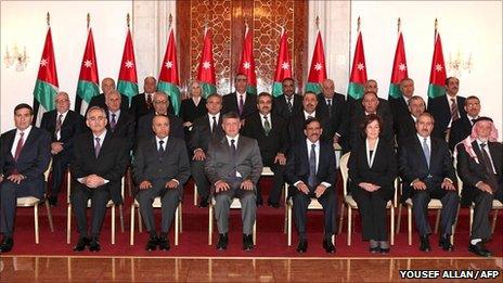 King Abdullah with the new Jordanian cabinet in Amman, 9 February (Jordanian Royal Palace handout)