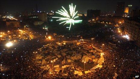 Egyptians set off fireworks in Tahrir Square, in Cairo, Egypt, 11 February 2011