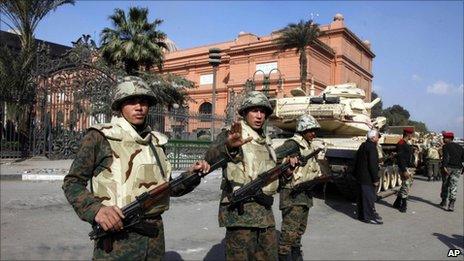 Soldiers guard the Egyptian Museum. Photo: 12 February 2011