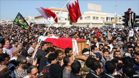 The body of a man killed on Monday is buried in Bahrain (15 February 2011)