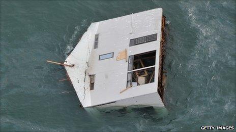 House floating off the coast of north-east Japan