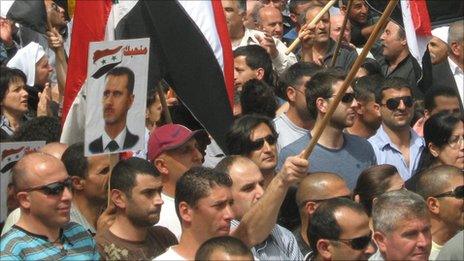 Protesters in support of Syrian President Assad