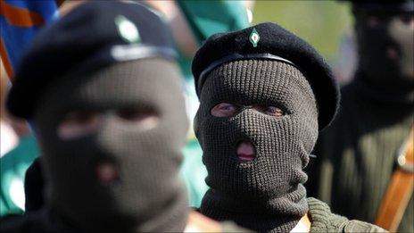 Masked members of the Real Irish Republican Army (RIRA)