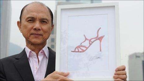 Shoemaker Jimmy Choo with a drawing of one of his creations