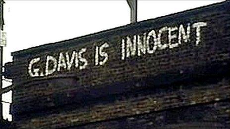 Motorway bridge with slogan about George Davis