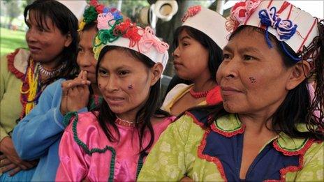 Indigenous women of the Embera ethnic group, among 200 people displaced from their land, at a park in Bogota, Colombia on 30 April, 2011