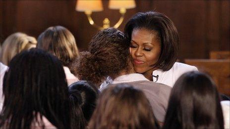 Michelle Obama hugs students at Oxford University